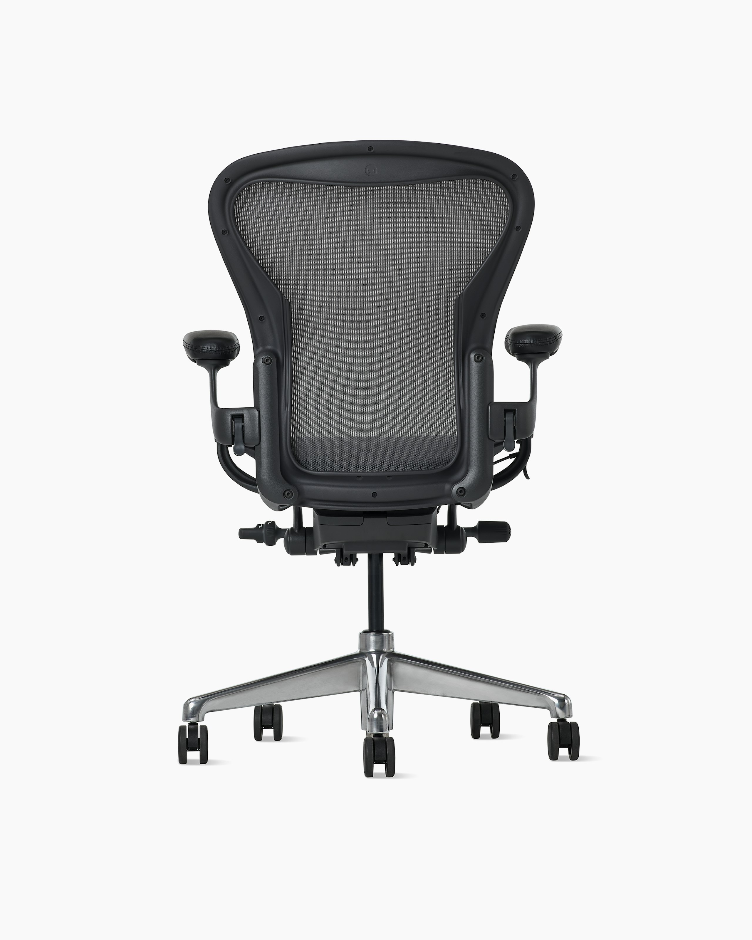 Rear view of an Aeron ESD chair in size B, granite frame and suspension and polished base.