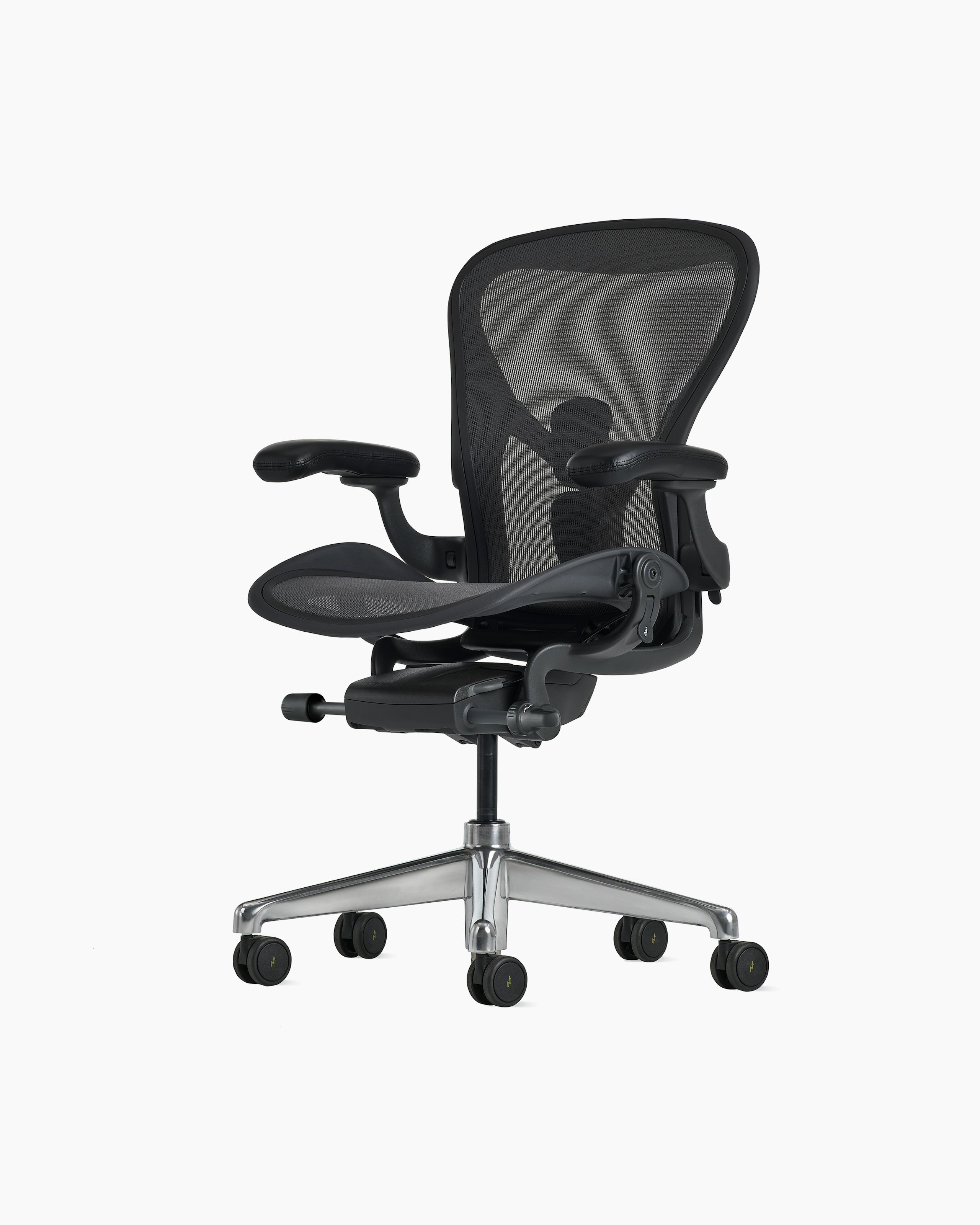Front angle view of an Aeron ESD chair in size B, granite frame and suspension and polished base.