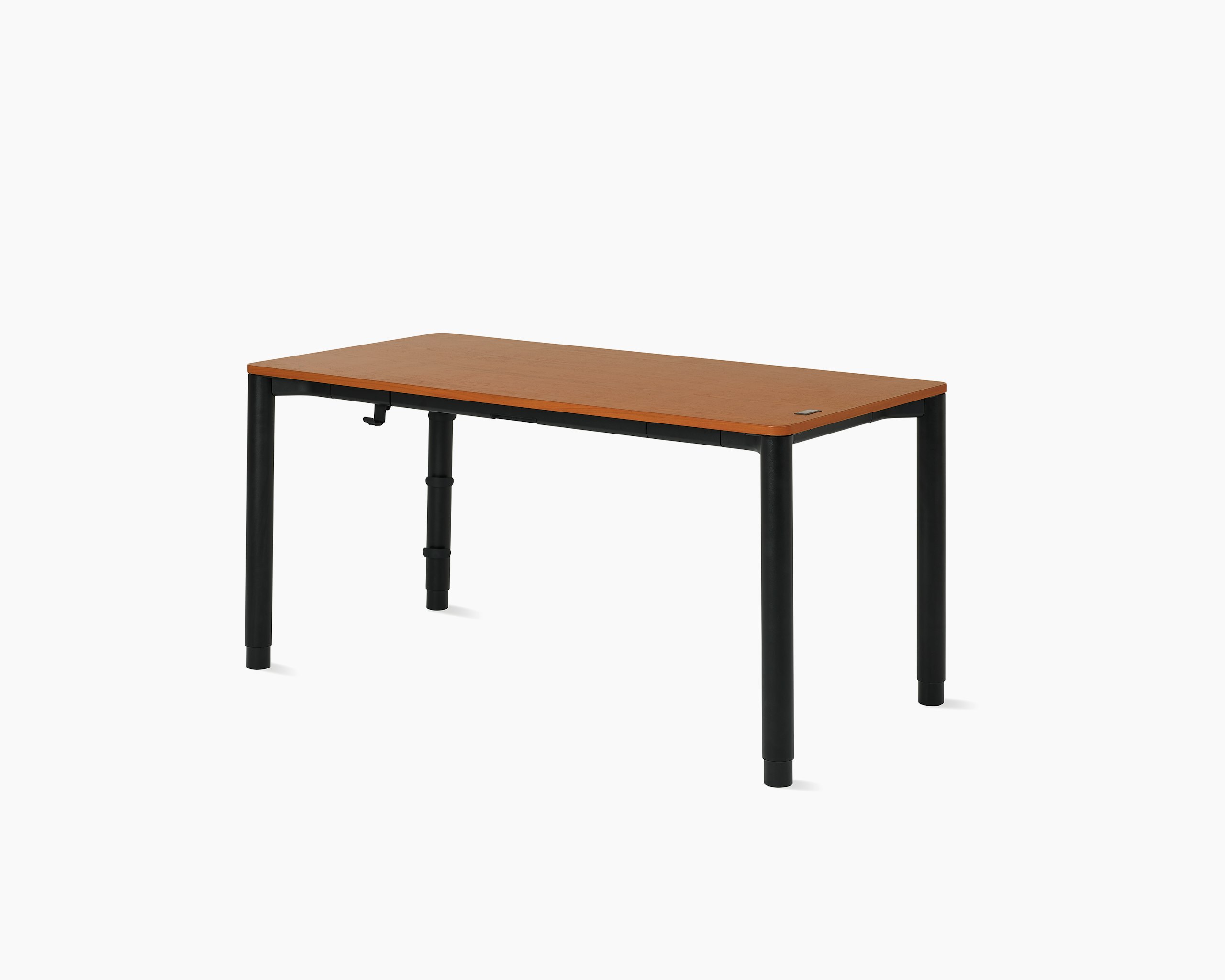 Four leg height-adjustable table with a woodgrain surface and black legs.