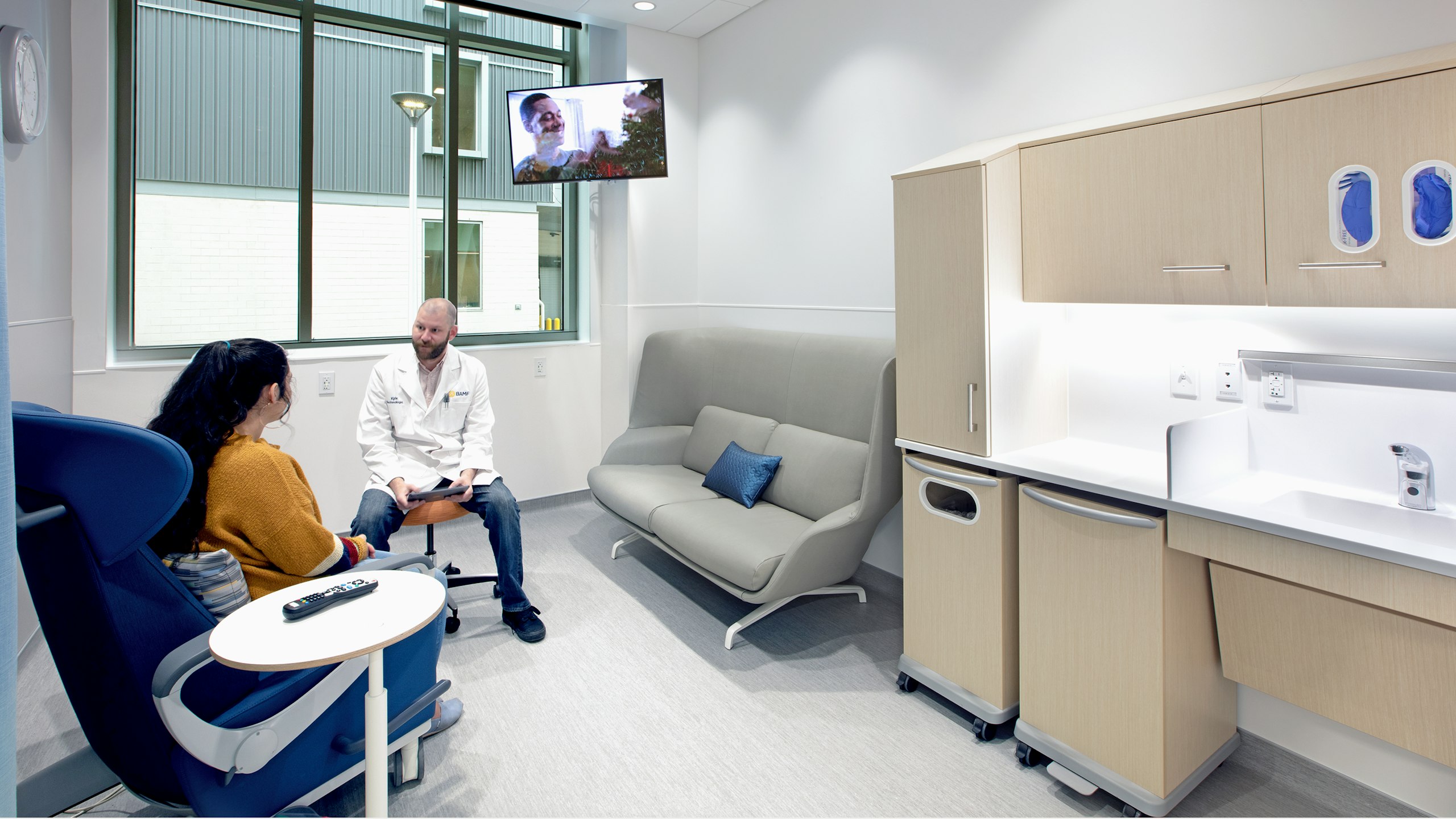 A doctor and patient sitting in a patient room at BAMF Health