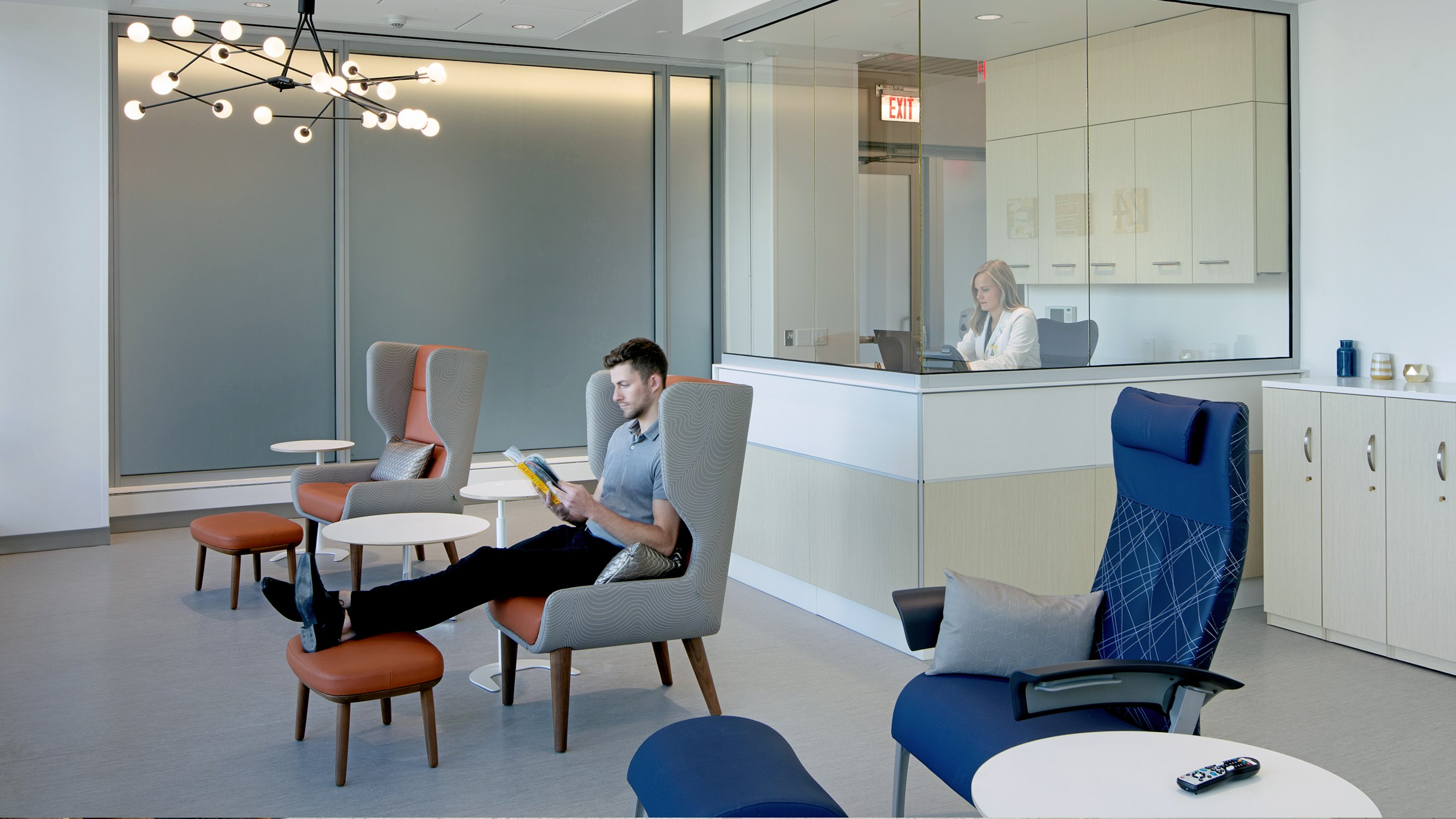 A person sitting in a reception area at BAMF Health